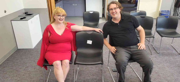 Congressional candidates Catherine Hildebrand (D) and Hunter Gordon (D) flank an empty seat reserved for Suzan DelBene (D), Marysville’s incumbent congresswoman.